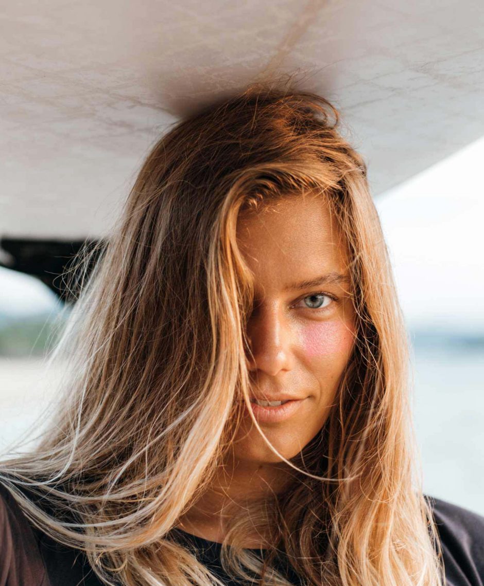 surfer-girl-on-beach-RF74LBQ-1.jpg